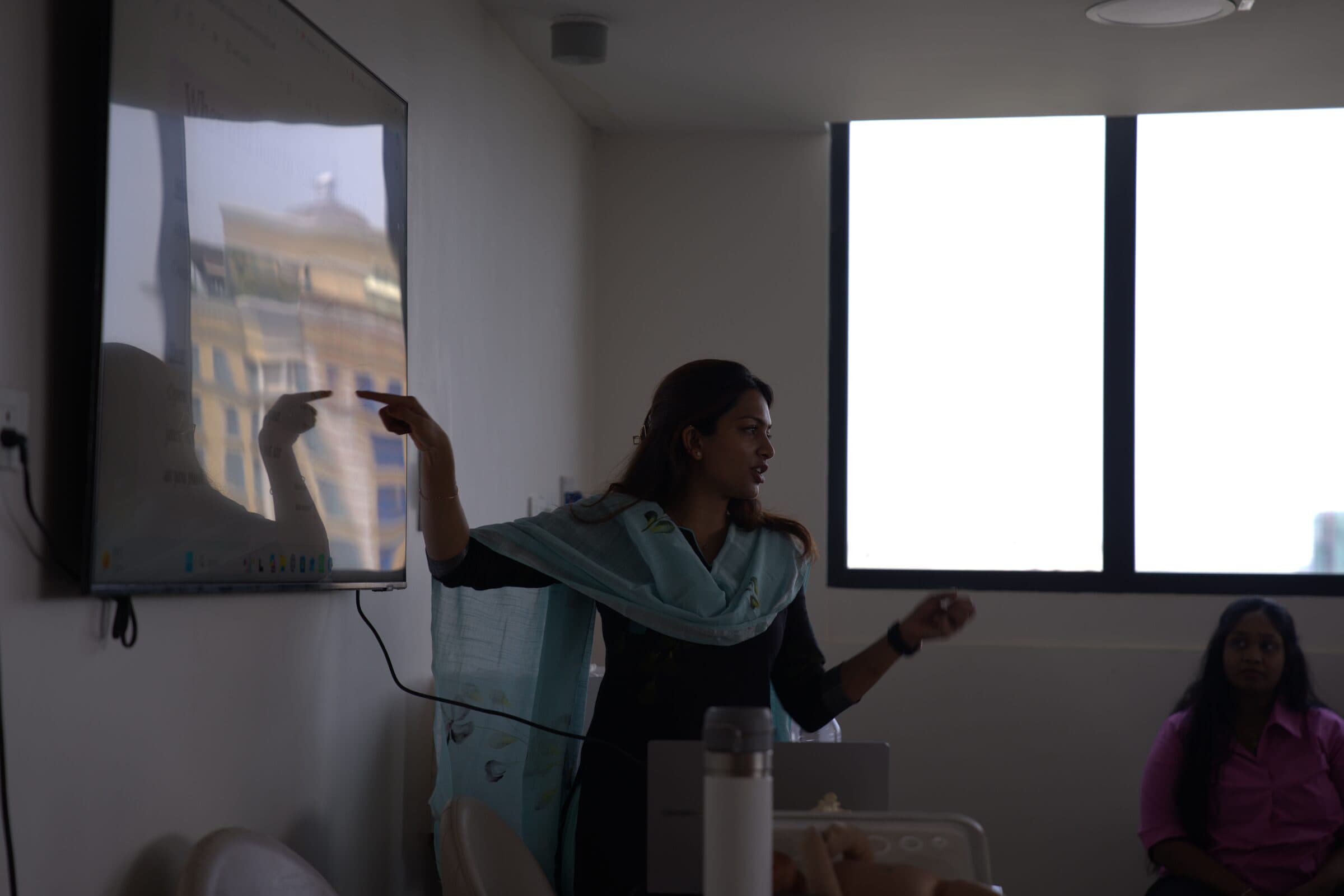Childbirth educator presenting to expectant parents