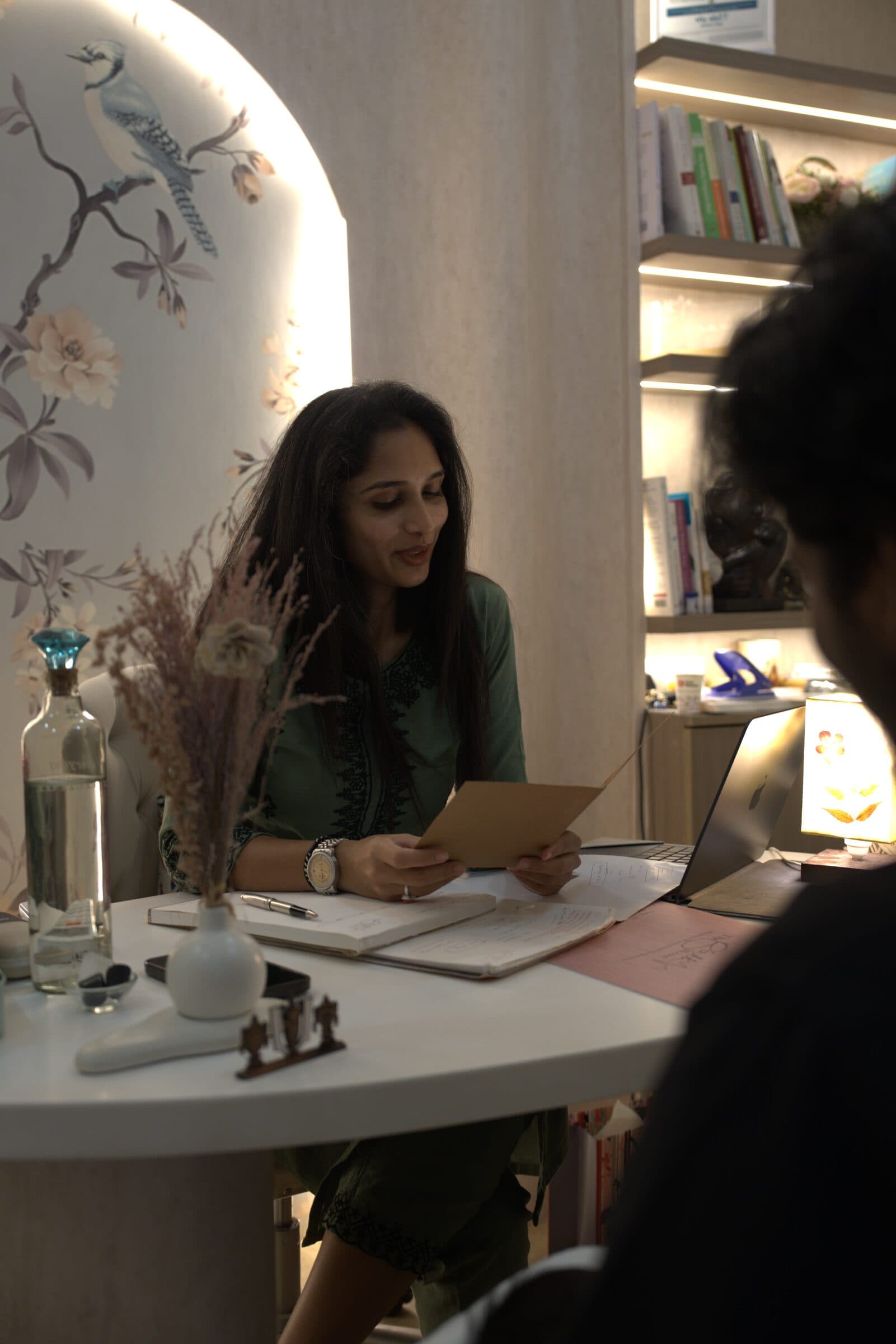 An expectant couple discusses birth plans and options with a clinician.